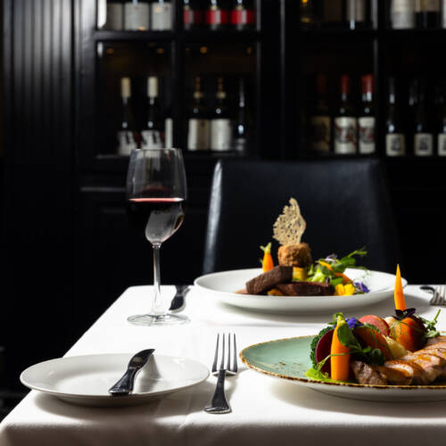 Dinner setting for two at The Regent Room Restaurant & Bar located at Regent of Rotorua